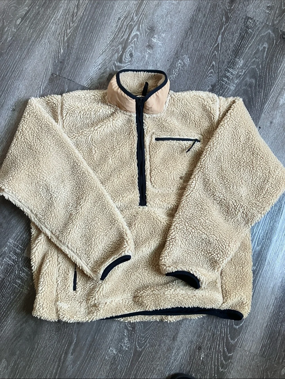 The North Face Extreme Pile Pullover in an almond butter/tan colorway